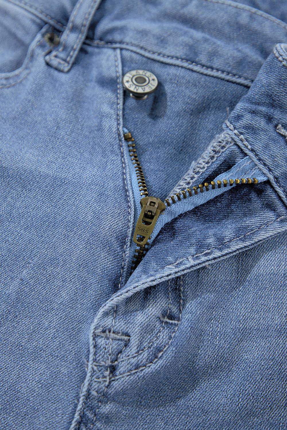 Asymmetric Button Zip Fly Ripped Jeans