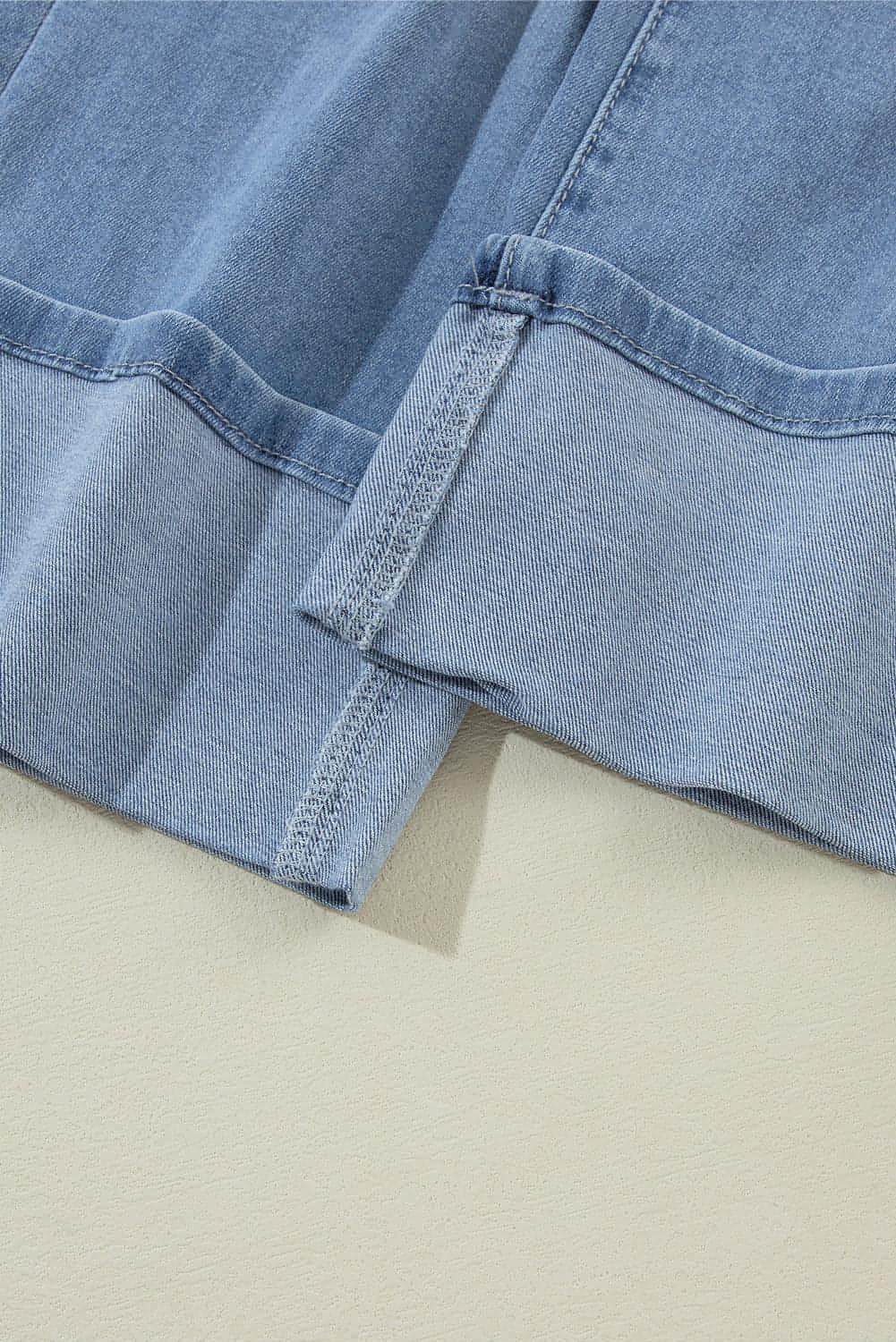 Asymmetric Button Zip Fly Ripped Jeans